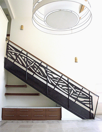 stair rail with stenciled steel panels